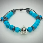 Pulsera ajustable de turquesas y dije de Gladiador plateado
