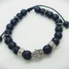 Pulsera ajustable de piedras naturales ónix mate y brillante con dije de mano de Fátima plateada
