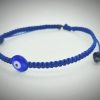 2025/08/1001177371.jpg Pulsera ajustable tejida a mano en hilo azul marino con dije de ojo turco