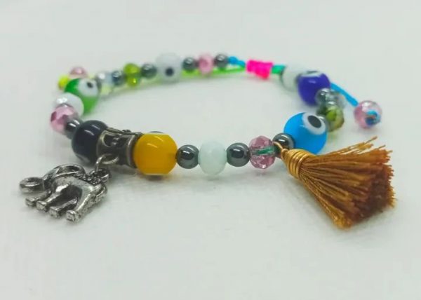 Pulsera ajustable de ojos turcos, cristales facetados, hematitas y dije de Elefante plateado