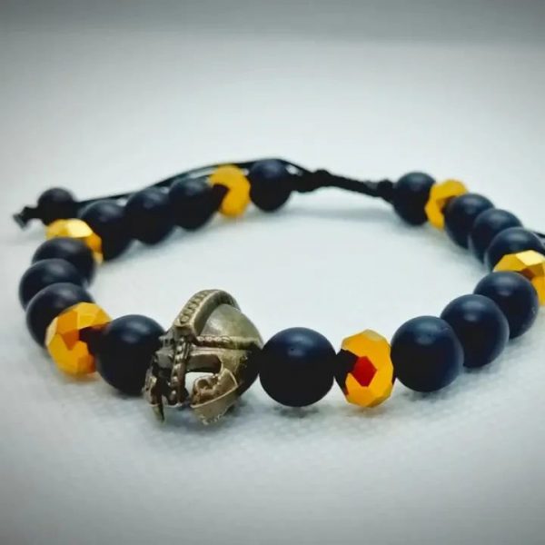 Pulsera ajustable de Gladiador en oro viejo con piedras naturales ónix mate y cristales dorados
