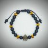 Pulsera ajustable de Gladiador en oro viejo con piedras naturales ónix mate y cristales dorados