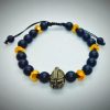 Pulsera ajustable de Gladiador en oro viejo con piedras naturales ónix mate y cristales dorados