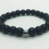 Pulsera de piedras naturales ónix mate con cuenta de hematita natural