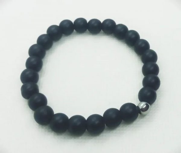 Pulsera de piedras naturales ónix mate con cuenta de hematita natural