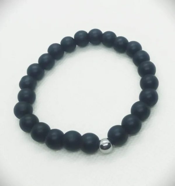 Pulsera de piedras naturales ónix mate con cuenta de hematita natural