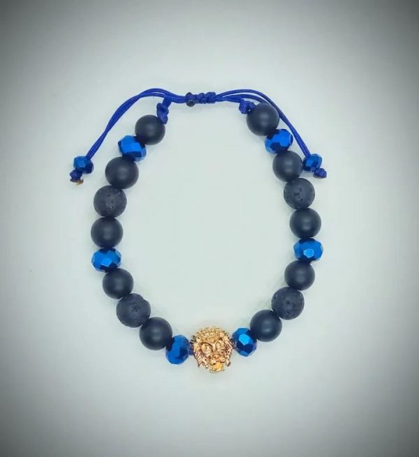 2026/01/1002576117.jpg Pulsera de cabeza de león con piedras naturales ónix mate, roca volcánica y cristales facetados azul eléctrico