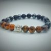 2026/01/1002582066.jpg Pulsera de Buda plateado con piedras naturales ónix, hematita y ojo de tigre